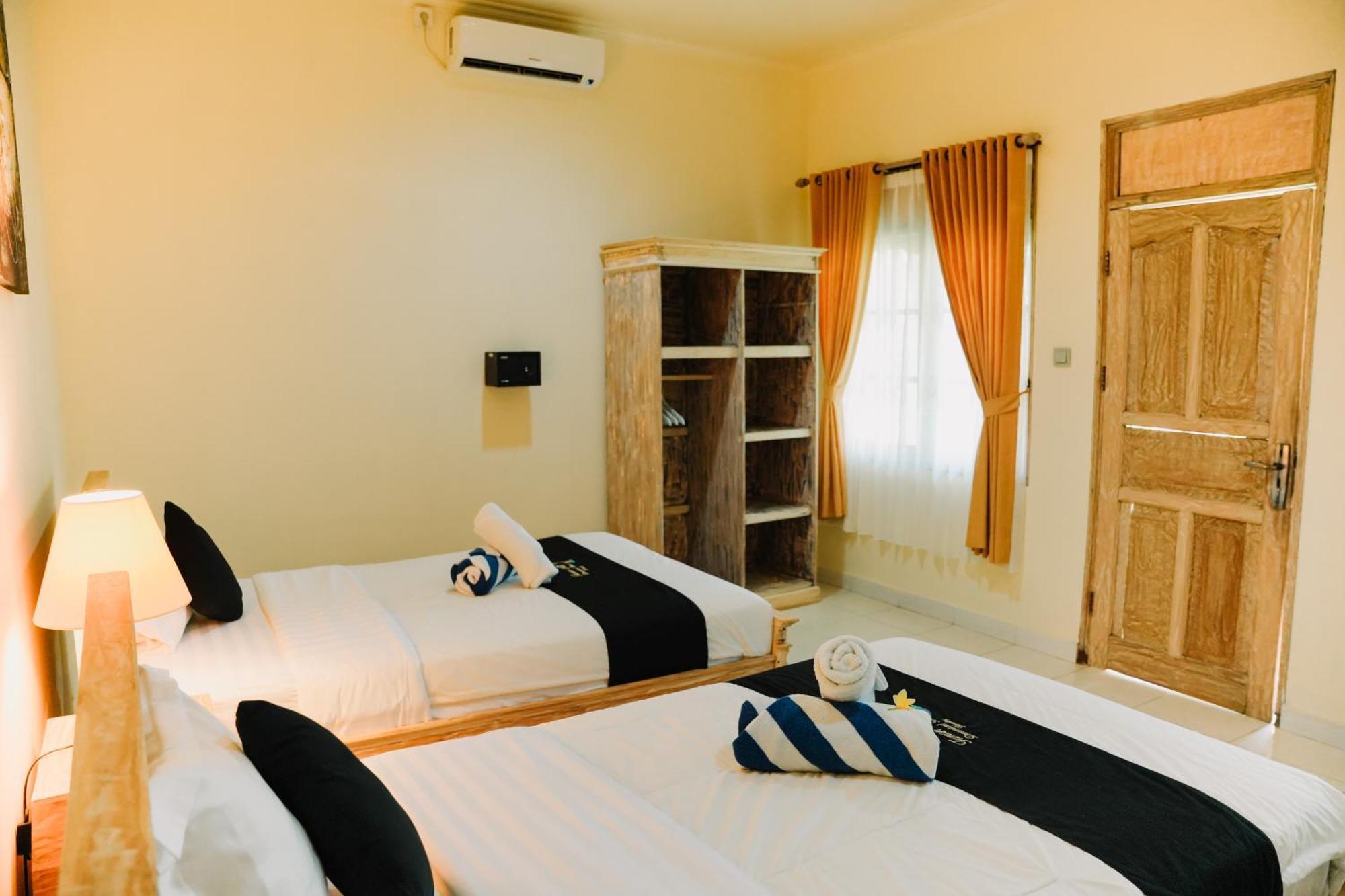 Taman Asih Bingin Homestay Улувату Номер фото