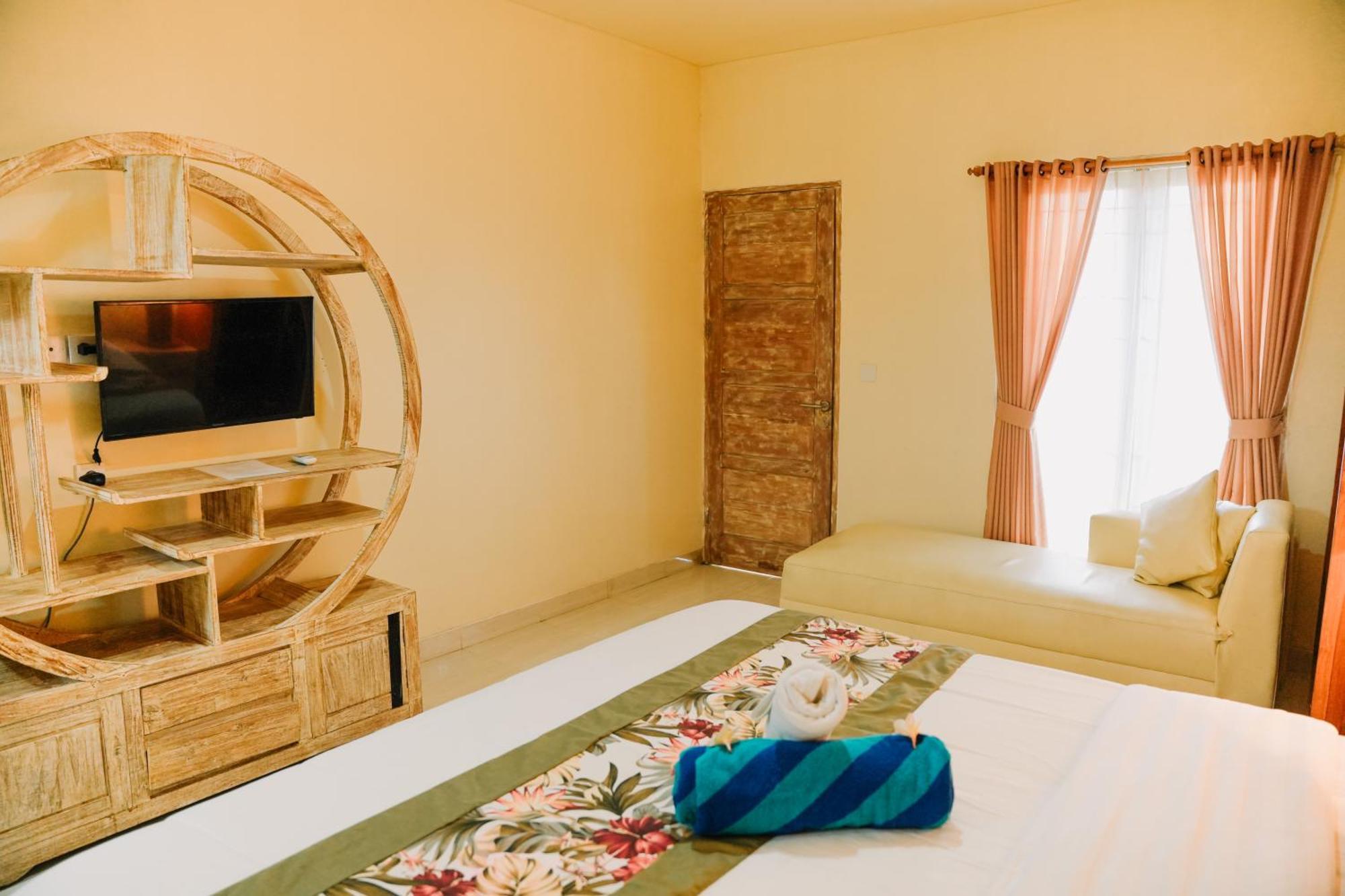 Taman Asih Bingin Homestay Улувату Номер фото
