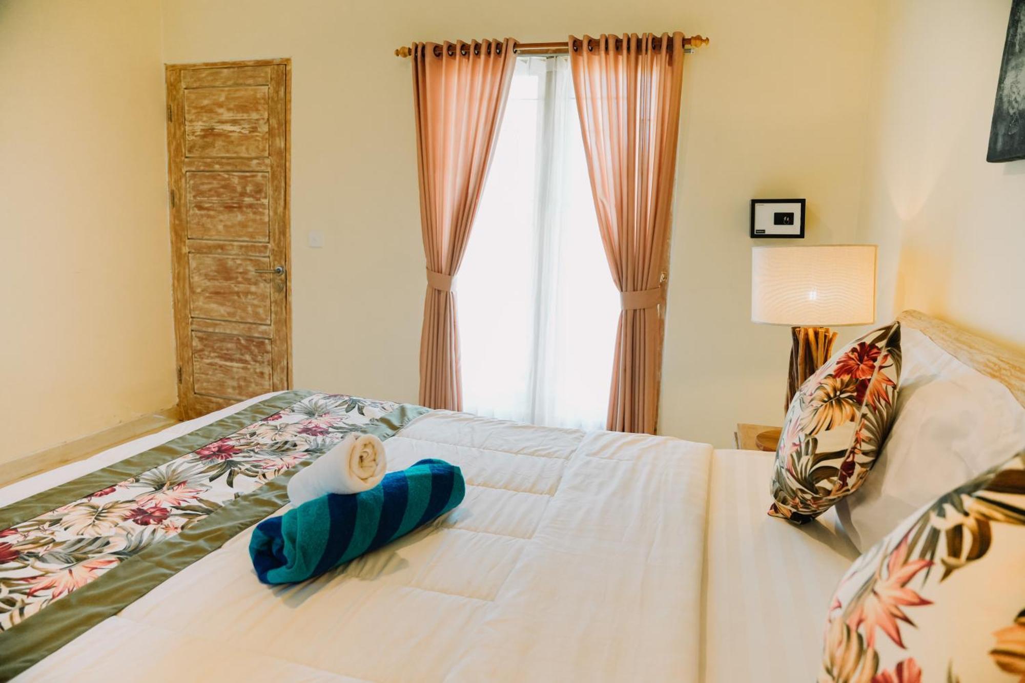 Taman Asih Bingin Homestay Улувату Номер фото