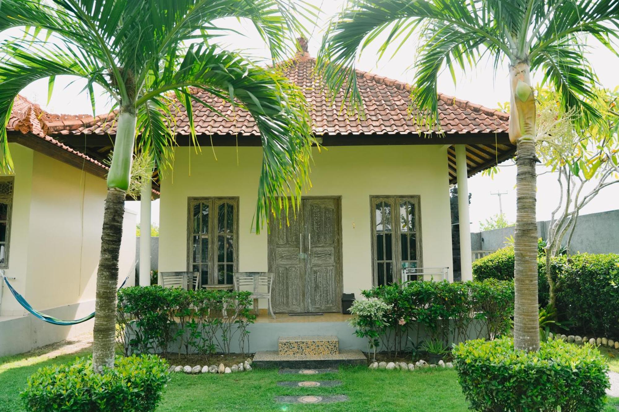 Taman Asih Bingin Homestay Улувату Номер фото