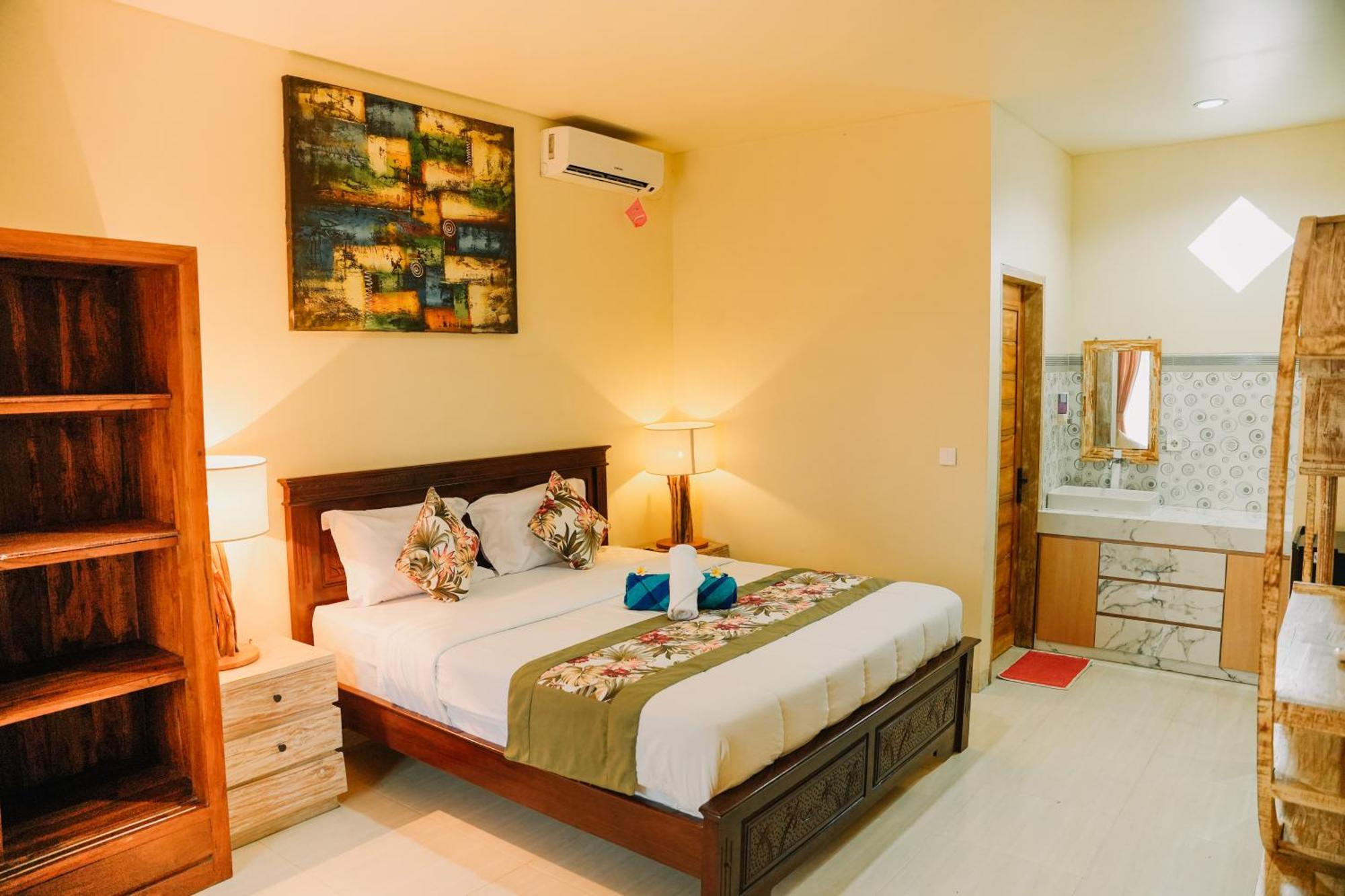 Taman Asih Bingin Homestay Улувату Номер фото
