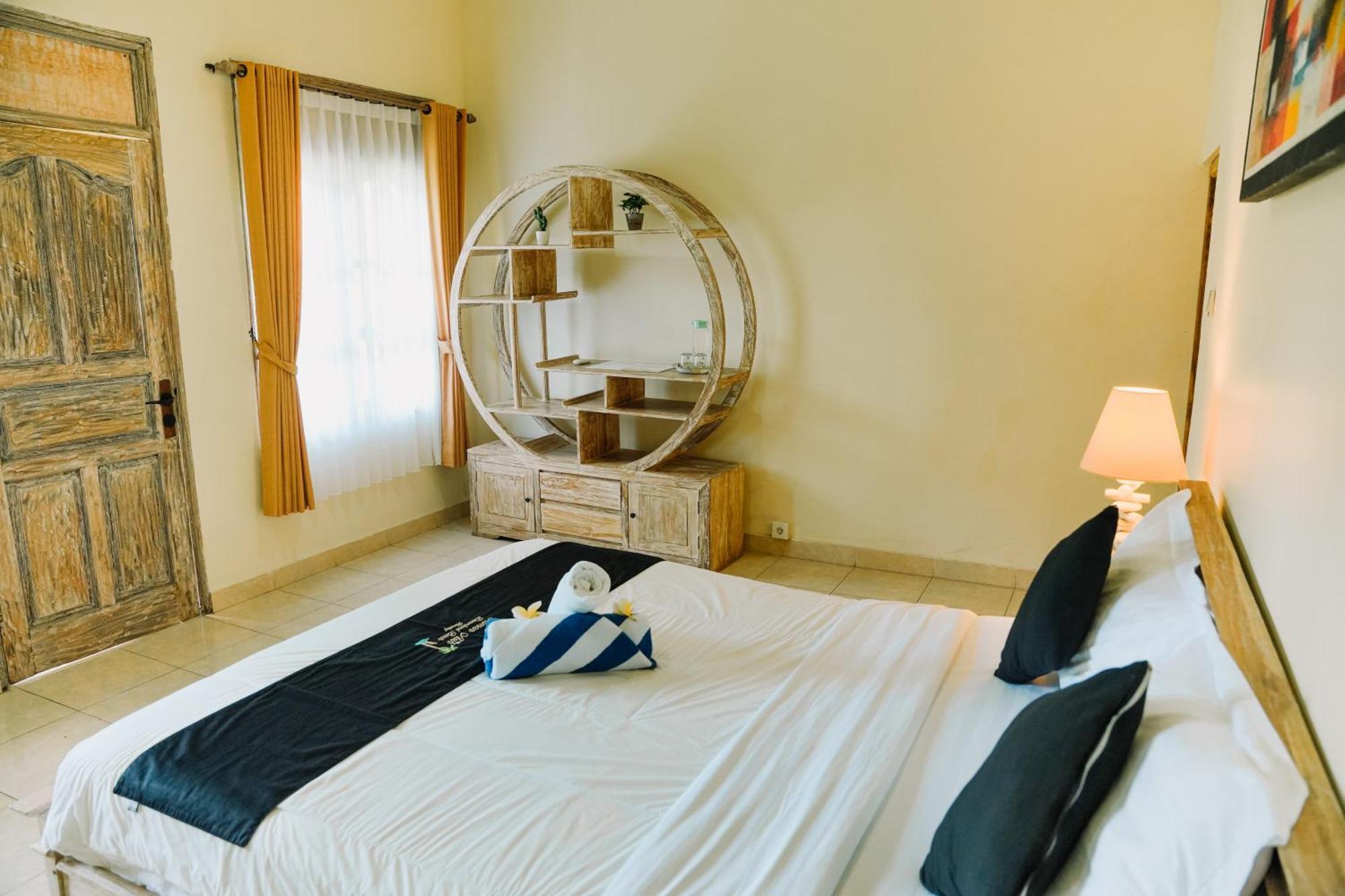 Taman Asih Bingin Homestay Улувату Номер фото